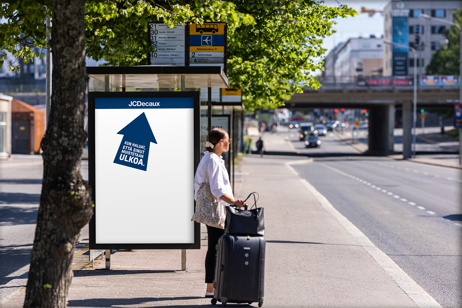 JCDecaux'in juliste bussipysäkillä Kuopiossa.